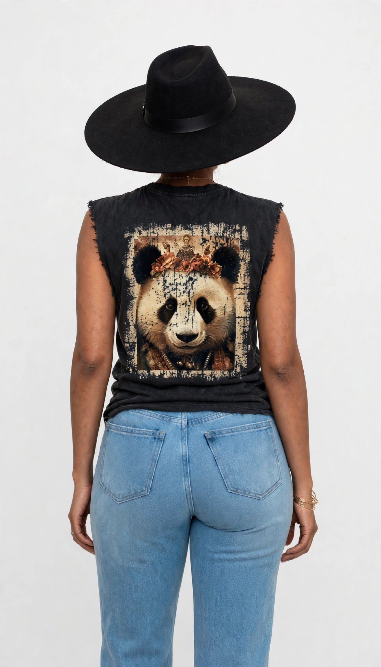 Back view of Erica modeling the black sleeveless cutoff tee with a large panda graphic