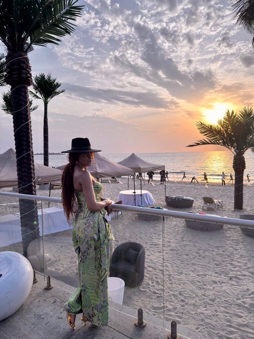 Erica overlooking a Sierra Leone beach at sunset