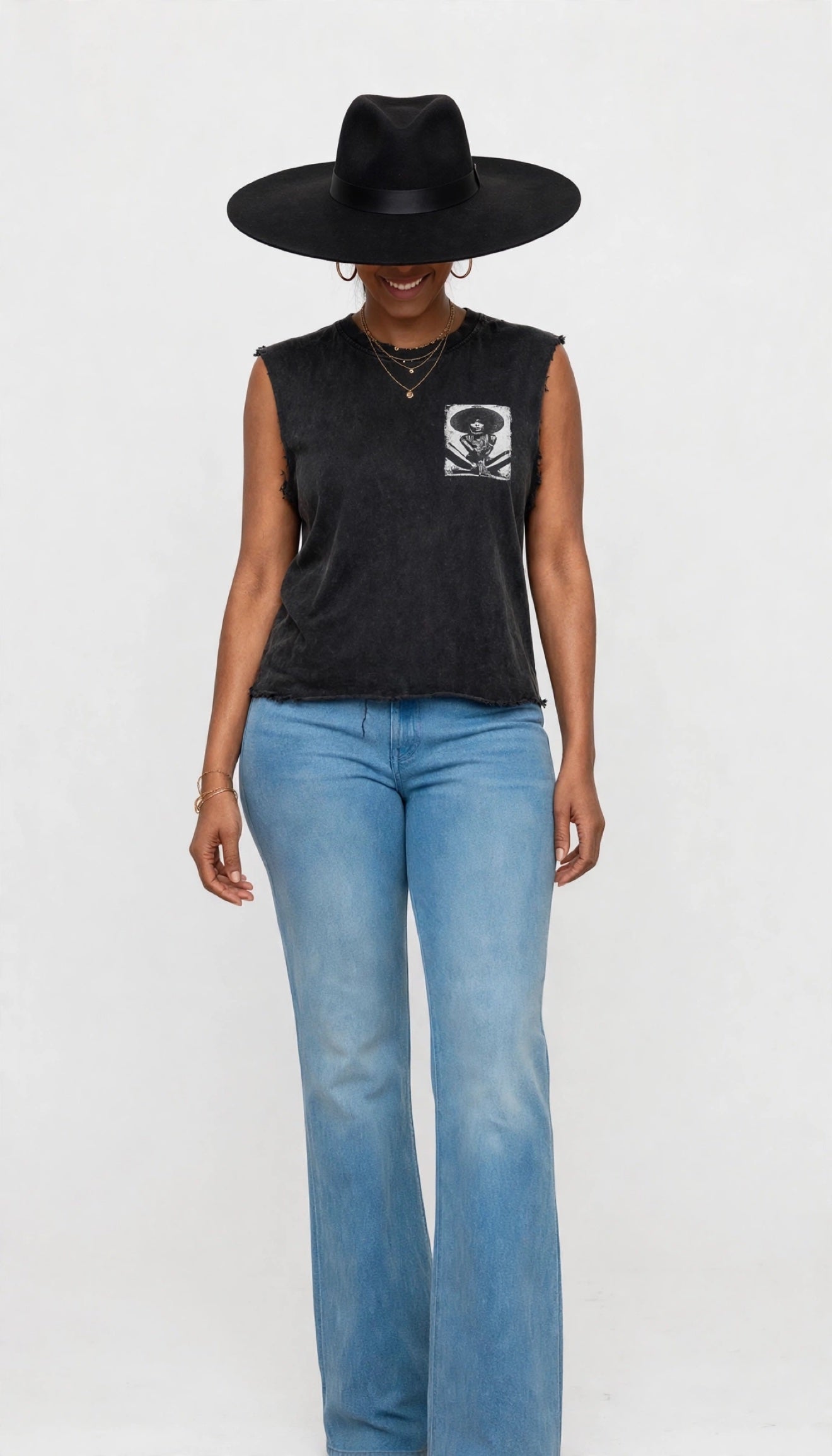 Front view of Erica modeling the face-paint kiss graphic tee